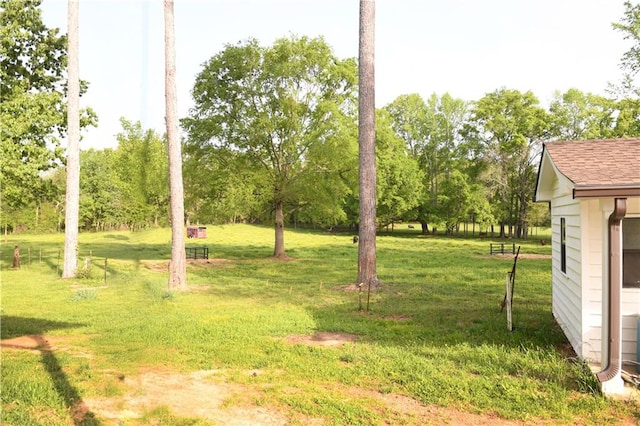 446 Brown Bridge Rd, Chatsworth, GA 30705 - view of grassy yard featuring view of wooded area