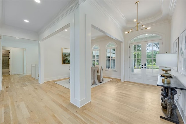 5651 Old Wilkie Rd, Gainesville, GA 30506 - foyer with french doors, a chandelier, crown molding, light wood finished floors, and recessed lighting
