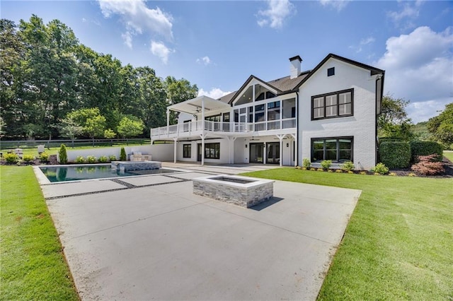 5651 Old Wilkie Rd, Gainesville, GA 30506 - back of property with a balcony, a patio area, stucco siding, an outdoor pool, and a fire pit