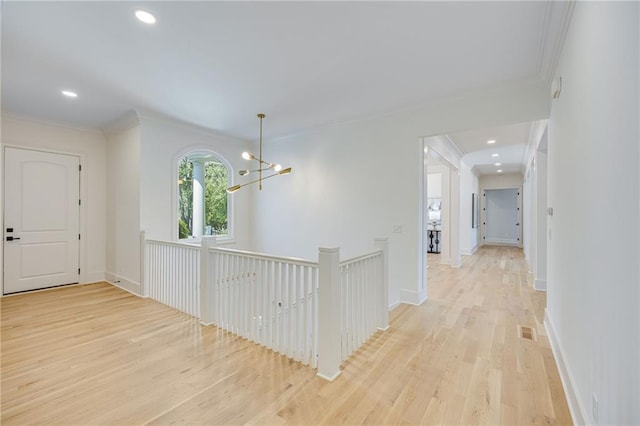 5651 Old Wilkie Rd, Gainesville, GA 30506 - corridor featuring light wood-type flooring, crown molding, a chandelier, an upstairs landing, and recessed lighting