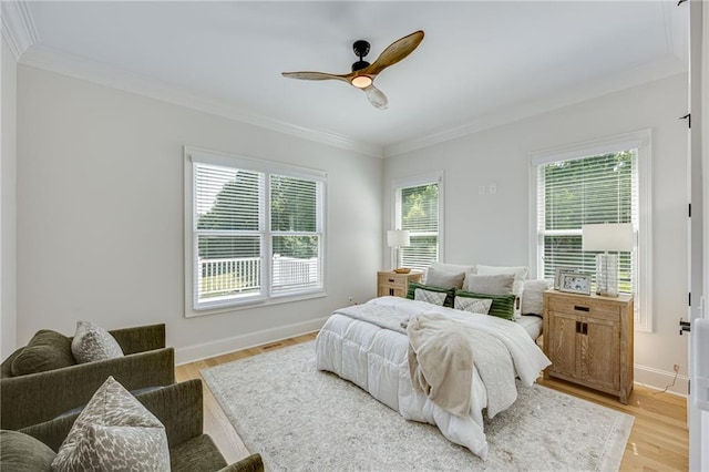 5651 Old Wilkie Rd, Gainesville, GA 30506 - bedroom with ornamental molding, light wood finished floors, and a ceiling fan