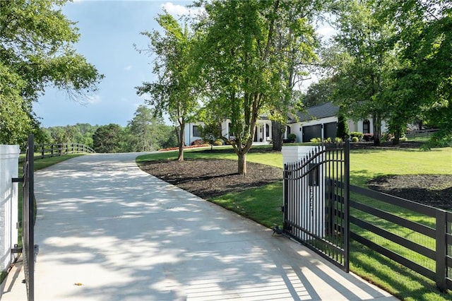 5651 Old Wilkie Rd, Gainesville, GA 30506 - view of community with a lawn and a gate