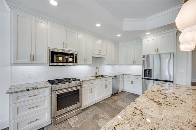 5651 Old Wilkie Rd, Gainesville, GA 30506 - kitchen featuring stainless steel appliances, white cabinetry, ornamental molding, tasteful backsplash, and recessed lighting