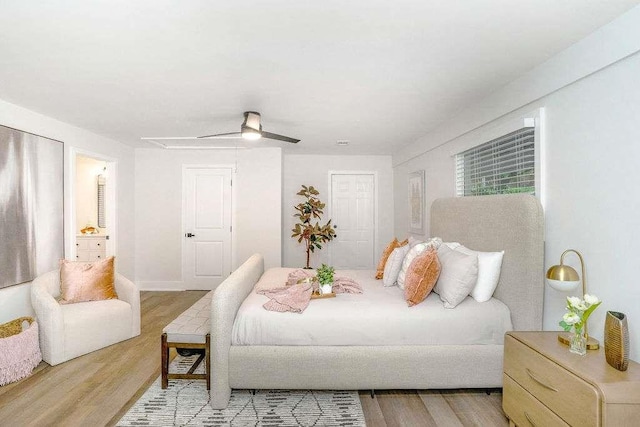 1091 Pine St, Conyers, GA 30012 - bedroom featuring wood finished floors and a ceiling fan