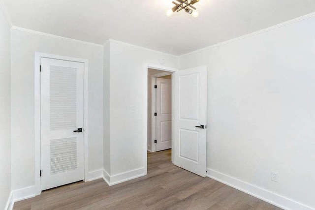 1091 Pine St, Conyers, GA 30012 - unfurnished room with wood finished floors and ornamental molding