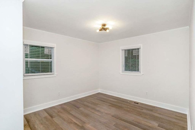 1091 Pine St, Conyers, GA 30012 - unfurnished room featuring wood finished floors and ornamental molding
