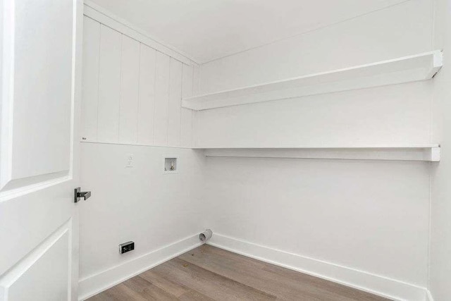 1091 Pine St, Conyers, GA 30012 - laundry room featuring wood finished floors and washer hookup