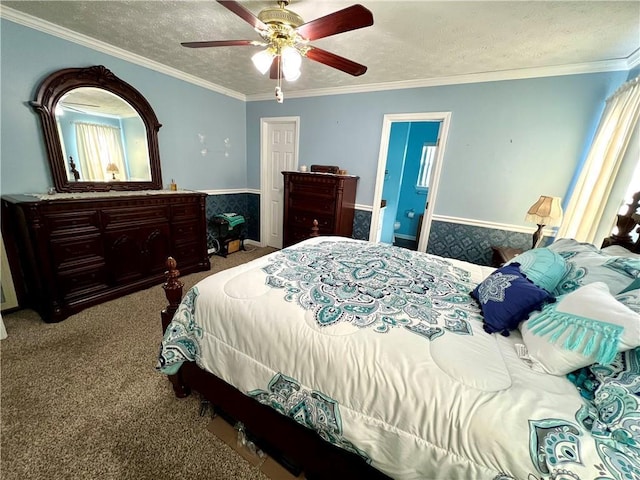 bedroom with ceiling fan, ornamental molding, a textured ceiling, and carpet flooring