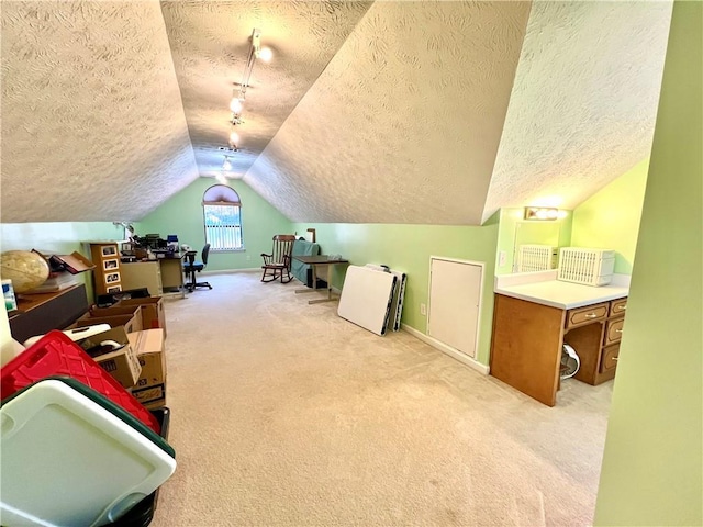 bonus room featuring lofted ceiling, light carpet, and a textured ceiling