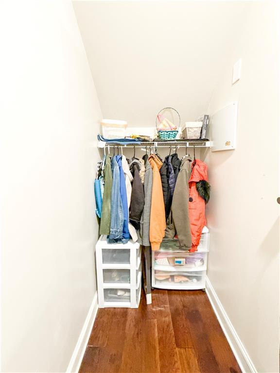 810 Pressing Dr, Alpharetta, GA 30004 - mudroom with wood finished floors, baseboards, and vaulted ceiling