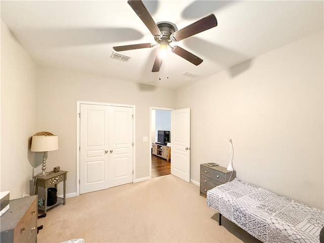 810 Pressing Dr, Alpharetta, GA 30004 - bedroom featuring light colored carpet, ceiling fan, a closet, and baseboards