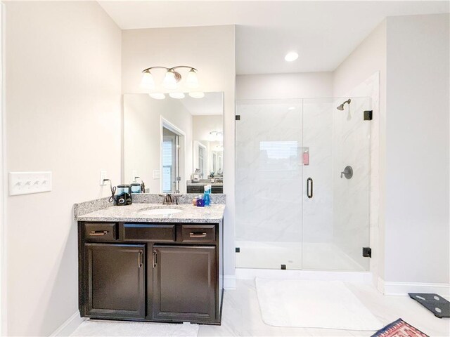 810 Pressing Dr, Alpharetta, GA 30004 - full bath with vanity, a marble finish shower, and baseboards