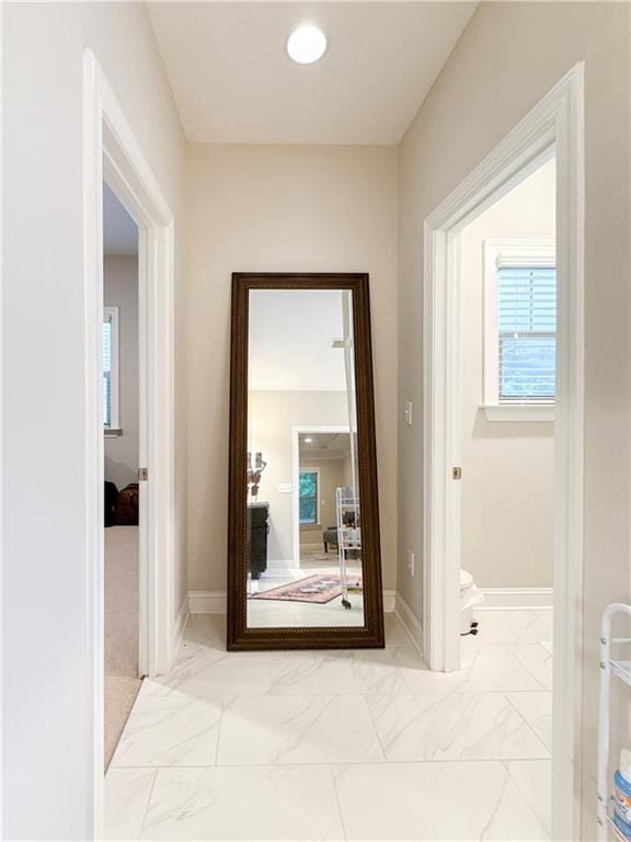 810 Pressing Dr, Alpharetta, GA 30004 - corridor featuring marble finish floors and baseboards