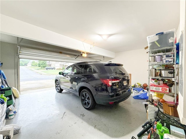 810 Pressing Dr, Alpharetta, GA 30004 - garage featuring a garage door opener
