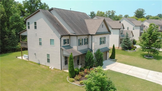 810 Pressing Dr, Alpharetta, GA 30004 - view of front of home featuring a front yard, a garage, driveway, and roof with shingles