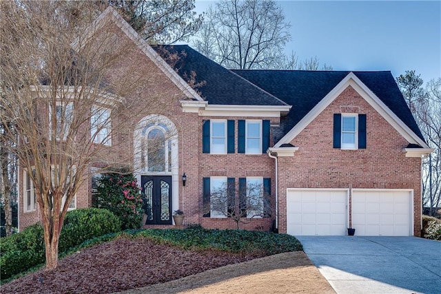 view of front of property featuring a garage