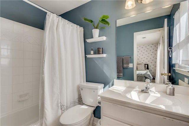 full bathroom featuring toilet, vanity, and shower / bath combination with curtain