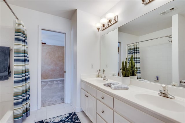 bathroom with vanity and tile patterned floors