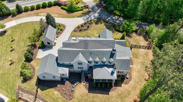 1530 Redd Rd, Milton, GA 30004 - rear view of property featuring stone siding, a lawn, a chimney, and fence