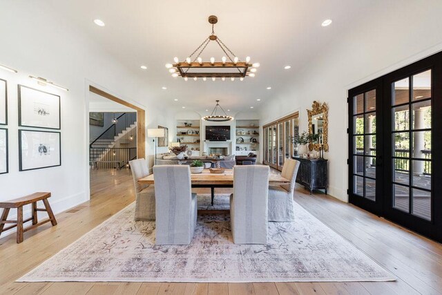 1530 Redd Rd, Milton, GA 30004 - dining room with a chandelier, french doors, light wood-style flooring, beam ceiling, and recessed lighting
