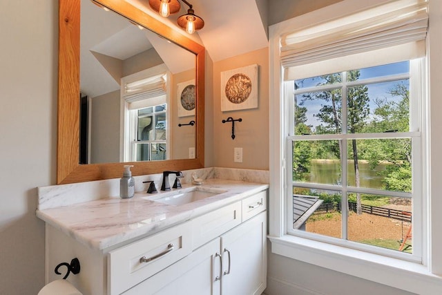 bedroom featuring light colored carpet, ceiling fan, baseboards, and visible vents