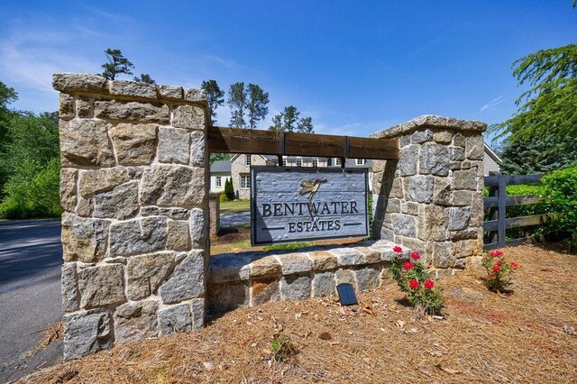 1530 Redd Rd, Milton, GA 30004 - view of front facade featuring brick siding, driveway, and a garage