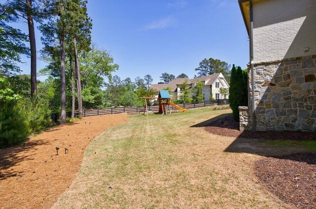 1530 Redd Rd, Milton, GA 30004 - view of yard featuring fence and a playground