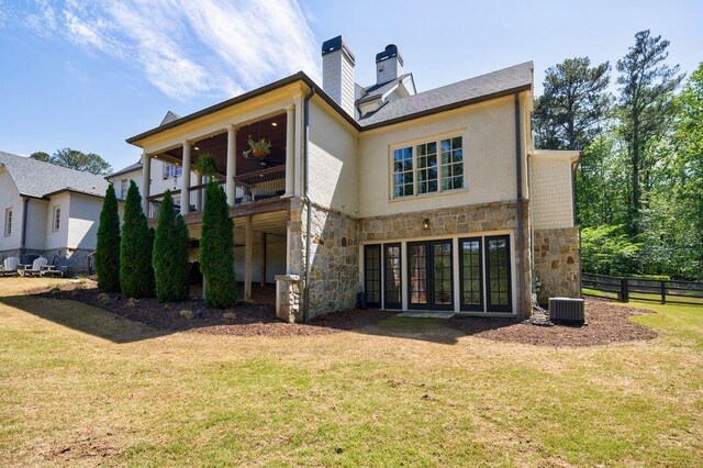1530 Redd Rd, Milton, GA 30004 - back of house with stairs, a lawn, a chimney, and a deck