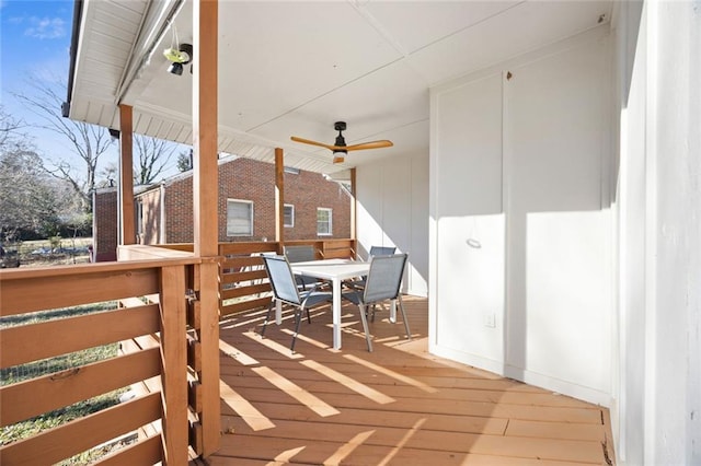 view of patio / terrace with a deck and ceiling fan