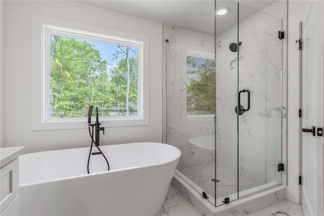6073 Rockingham Way, Gainesville, GA 30506 - full bath with a freestanding bath, a marble finish shower, plenty of natural light, and marble finish floor