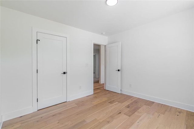 6073 Rockingham Way, Gainesville, GA 30506 - unfurnished bedroom with light wood-style floors and baseboards