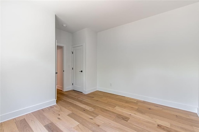 6073 Rockingham Way, Gainesville, GA 30506 - unfurnished room with baseboards and light wood finished floors