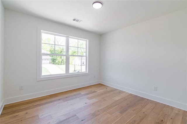 6073 Rockingham Way, Gainesville, GA 30506 - empty room with baseboards, light wood-type flooring, and visible vents