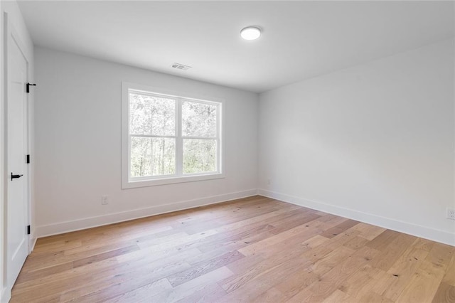 6073 Rockingham Way, Gainesville, GA 30506 - spare room featuring baseboards, visible vents, and light wood-type flooring
