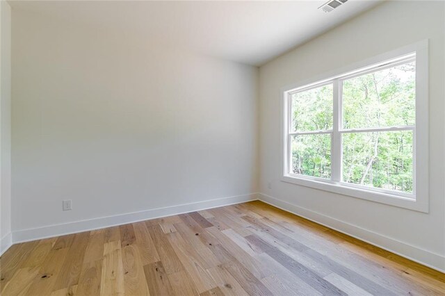 6073 Rockingham Way, Gainesville, GA 30506 - spare room with light wood-style floors, baseboards, and visible vents