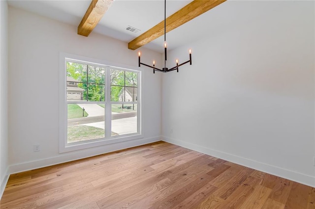 6073 Rockingham Way, Gainesville, GA 30506 - unfurnished dining area featuring visible vents, light wood-type flooring, baseboards, beamed ceiling, and a chandelier