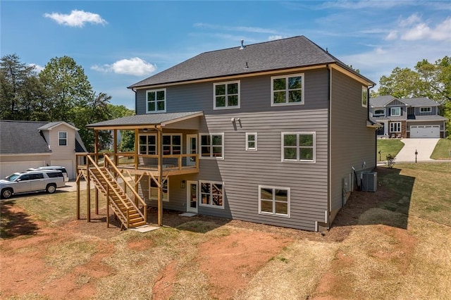 6073 Rockingham Way, Gainesville, GA 30506 - rear view of property featuring a lawn, stairway, a deck, and cooling unit