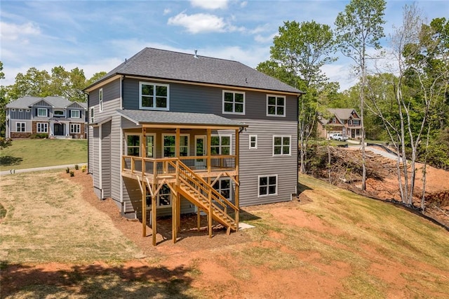 6073 Rockingham Way, Gainesville, GA 30506 - back of property featuring a wooden deck, stairs, a shingled roof, and a yard