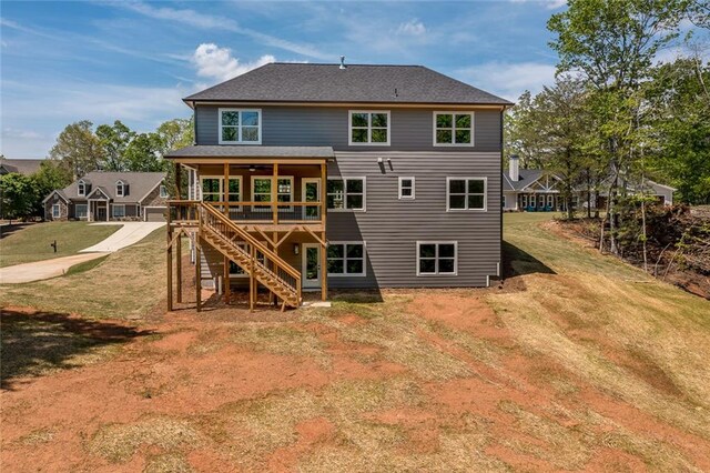 6073 Rockingham Way, Gainesville, GA 30506 - back of house featuring a wooden deck, stairs, a ceiling fan, a shingled roof, and a lawn