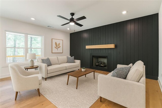 6073 Rockingham Way, Gainesville, GA 30506 - living area with ceiling fan, a large fireplace, recessed lighting, light wood-type flooring, and visible vents