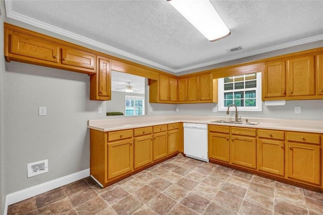 kitchen with plenty of natural light, sink, dishwasher, and light tile floors