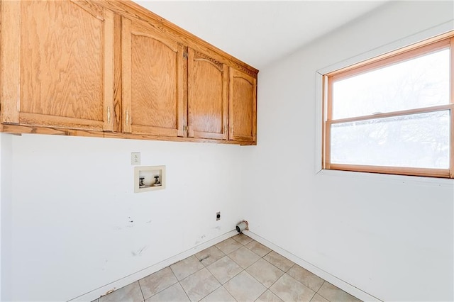 washroom with washer hookup, light tile patterned floors, cabinet space, electric dryer hookup, and baseboards