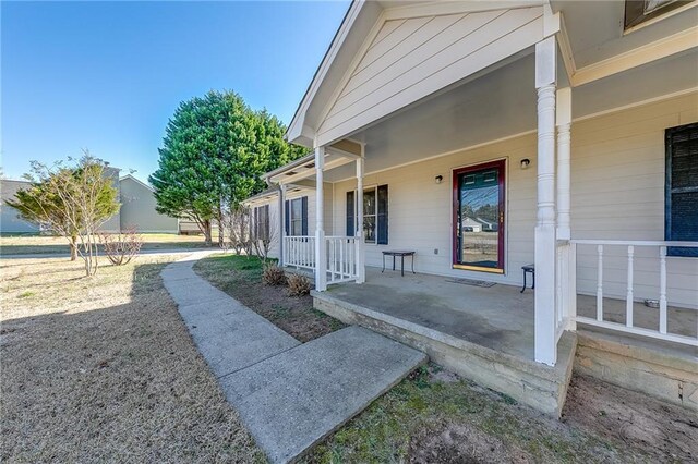 entrance to property with covered porch