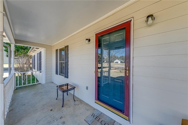 property entrance featuring covered porch