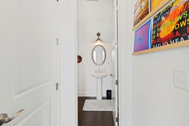 hallway featuring hardwood / wood-style floors