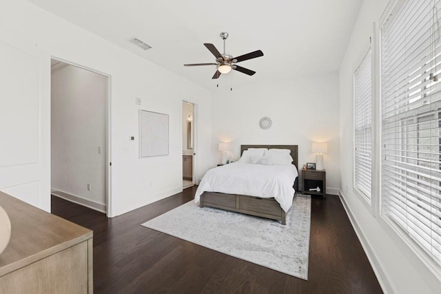 bedroom featuring ceiling fan and dark hardwood / wood-style flooring