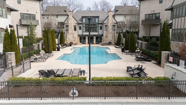 view of pool featuring a patio area