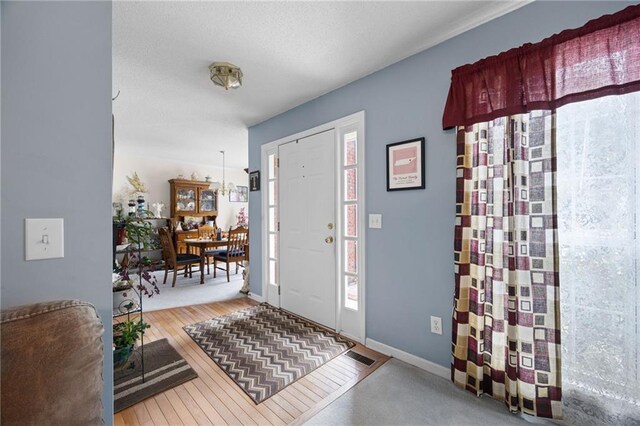 foyer featuring hardwood / wood-style floors