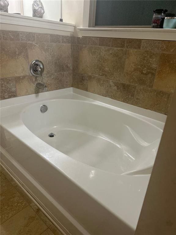 1749 Misselthrush Ln, Mcdonough, GA 30253 - bathroom with a bath