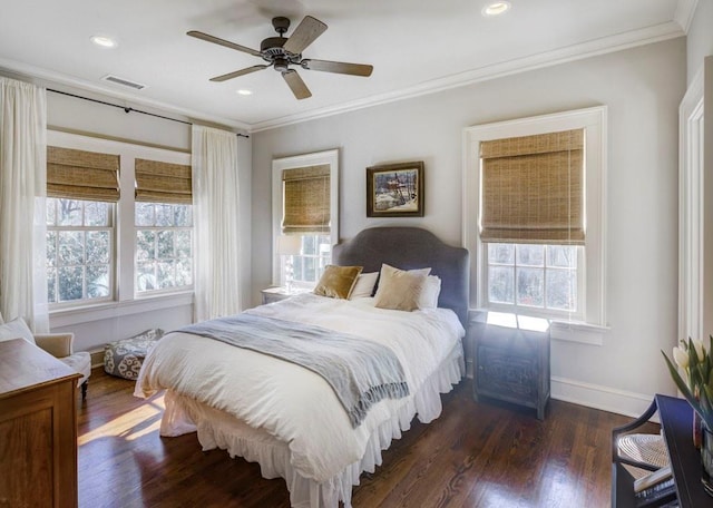 bedroom featuring baseboards, ornamental molding, recessed lighting, visible vents, and wood finished floors